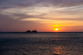 Sunset Harmony, Your Escape at Playa Hermosa